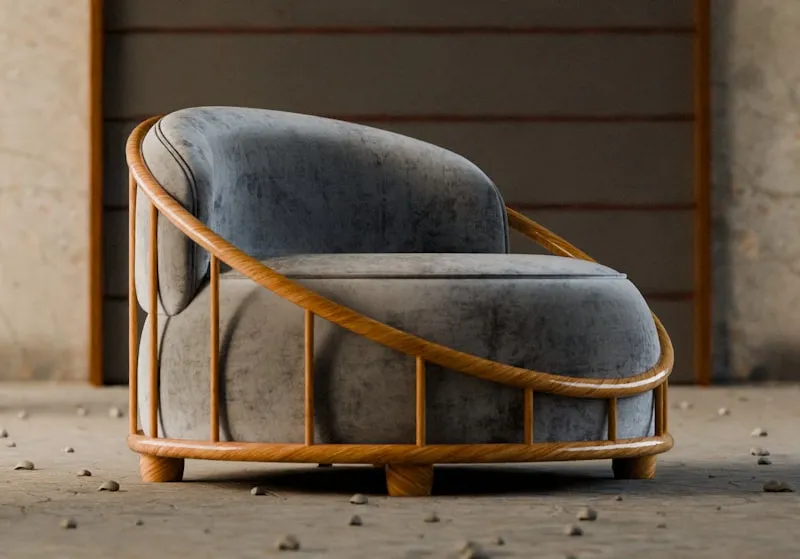 Grey velvet armchair enclosed by a curved steam-bent oak slat frame that wraps around the back and arms like a basket, on a bare textured floor.